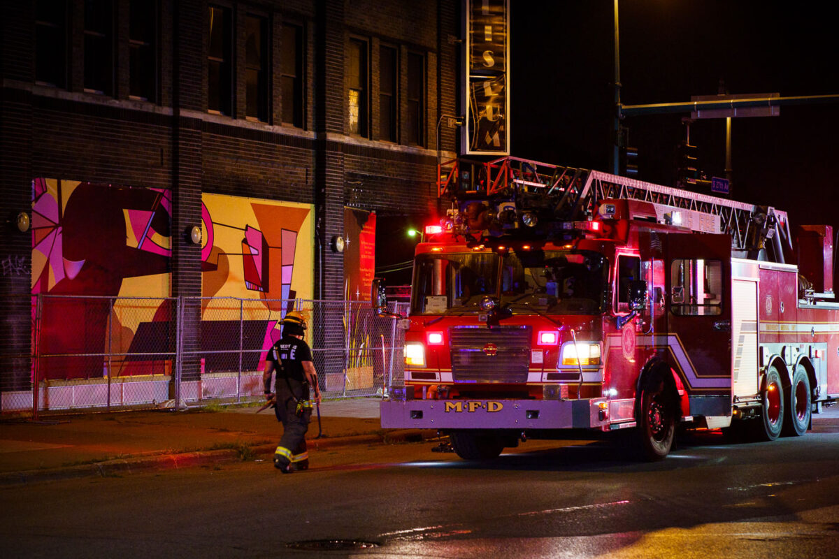 Firefighters fight a fire in the vacant Coliseum building. The building has sat empty after being burned in May 2020. Re-development is set to begin soon.