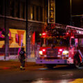 Firefighters fight a fire in the vacant Coliseum building. The building has sat empty after being burned in May 2020. Re-development is set to begin soon.