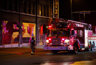 Firefighters fight a fire in the vacant Coliseum building. The building has sat empty after being burned in May 2020. Re-development is set to begin soon.