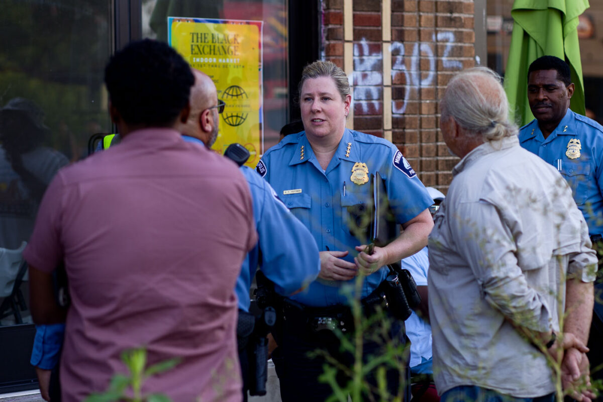 Interim Minneapolis Police Chief Huffman arrives at George Floyd Square for a "Community Conversation" on public safety. The forum was also attended by Hennepin County Attorney candidates.