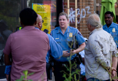 Interim Minneapolis Police Chief Huffman arrives at George Floyd Square for a "Community Conversation" on public safety. The forum was also attended by Hennepin County Attorney candidates.