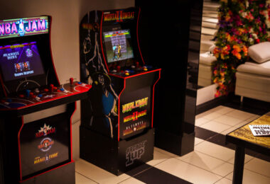 Arcade games inside Jughouse on Hennepin Ave in Uptown Minneapolis. Justice for George Floyd stickers on the table.