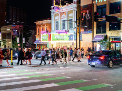 Crowds exit Orpheum Theatre, Hennepin Ave, Minneapolis
