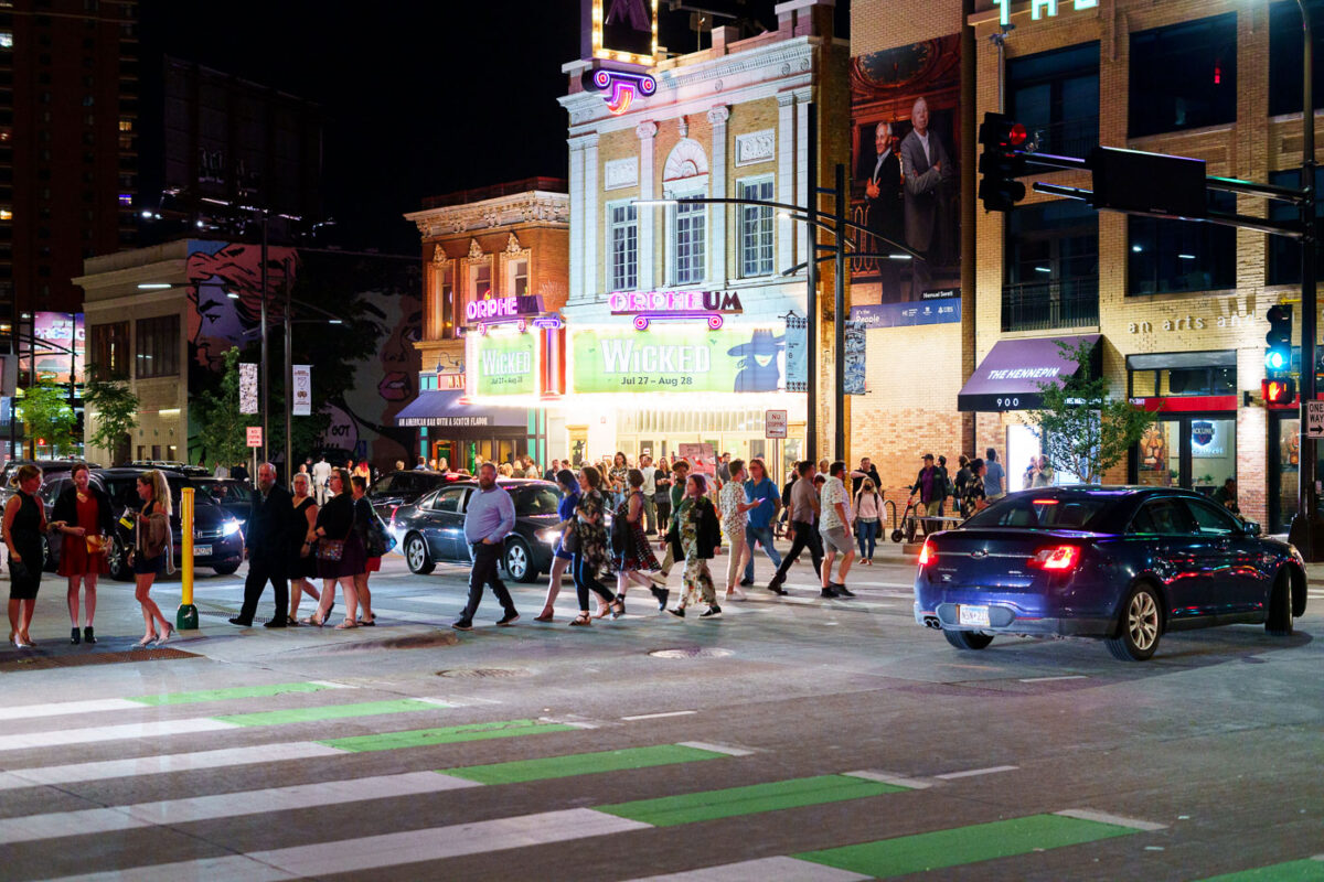 Crowds leave the Orpheum Theatre on Hennepin Ave in Downtown Minneapolis on a Friday night in August. 2022.