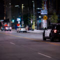 A Minneapolis police squad car drives down Hennepin Avenue in Downtown Minneapolis.