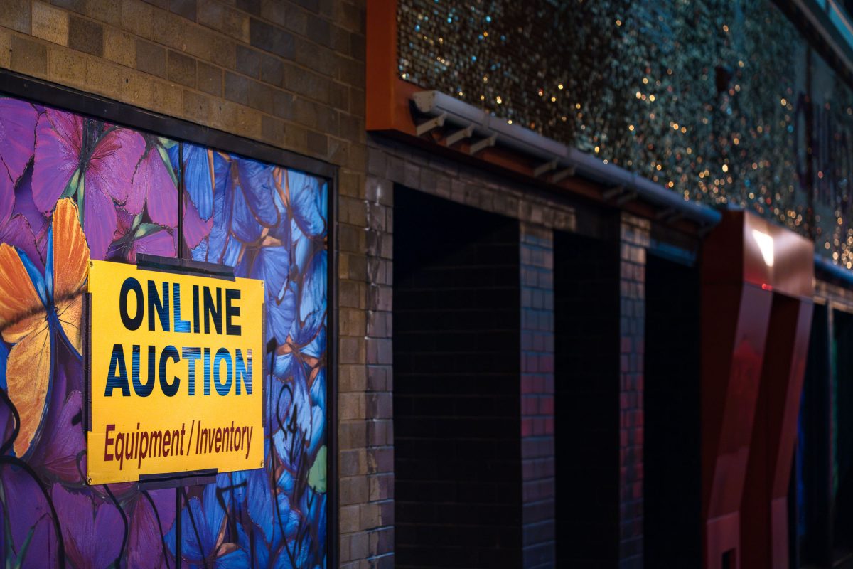 Online auction sign at former Chino Latino restaurant on Hennepin Ave