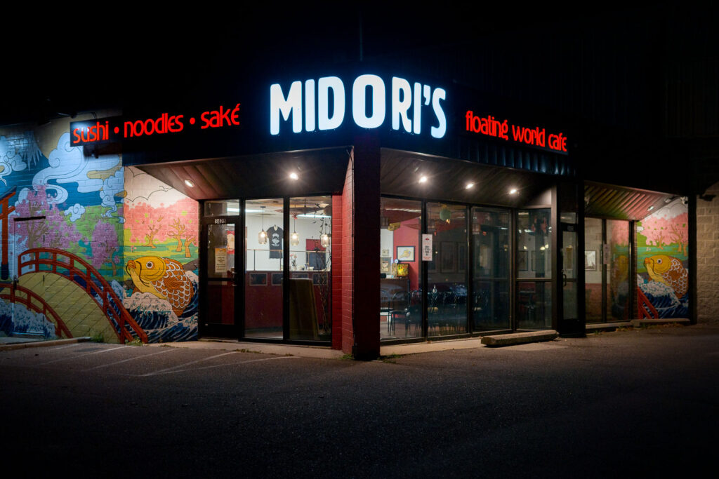 Midori's Floating World Cafe was located a block from the third precinct. Their former building still stands next to the destroyed building that was home to Minnehaha Liquors. Midori's has been open since April at their new location a half mile down the road - in a former Subway.