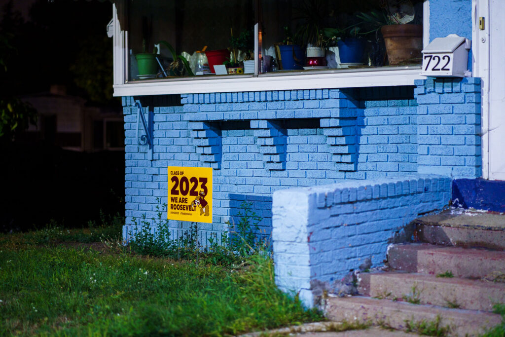 A "Class of 2023 We are Roosevelt" yard sign in a South Minneapolis front yard.