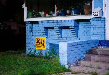 A "Class of 2023 We are Roosevelt" yard sign in a South Minneapolis front yard.