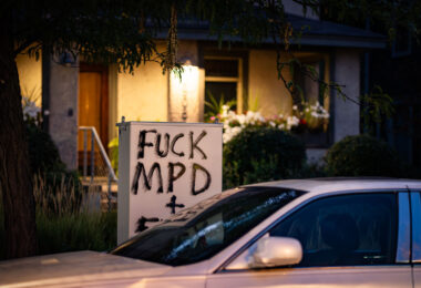 Graffiti on an electrical box in Uptown Minneapolis reading “FUCK MPD”