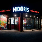 Midori's Floating World Cafe was located a block from the third precinct. Their former building still stands next to the destroyed building that was home to Minnehaha Liquors. Midori's has been open since April at their new location a half mile down the road - in a former Subway.