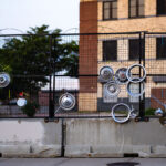 An art installation on the fencing around the Minneapolis Police Third Precinct. The Precinct was destroyed during riots following the murder of George Floyd.