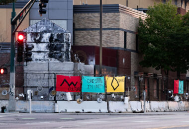 An art installation on the fencing around the Minneapolis Police Third Precinct. The Precinct was destroyed during riots following the murder of George Floyd.