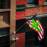 A flag hanging in downtown Minneapolis.
