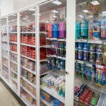 Locked Personal-Care Aisle at Target’s Downtown Minneapolis St 2 Personal-care items—including toothpaste, toothbrushes, and other everyday hygiene products—sit behind locked Plexiglas cabinets at the Target flagship store in downtown Minneapolis. In recent years, large retailers across U.S. urban centers have expanded the use of secured cases for small, easily resold goods in response to rising shrink and merchandise loss. At this location, much of the oral-care section now requires staff assistance to access, reflecting a broader shift in store security strategies and retail operations in high-traffic downtown corridors.