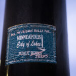 "All my friends bully the Minneapolis Public Works(Jerks)" sticker on a light pole. In response to Public Works participating in encampment clearings.