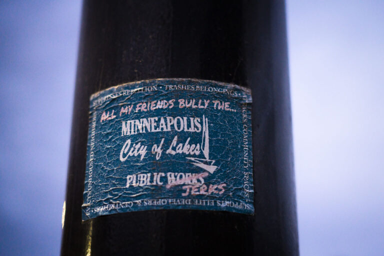 All my friends bully the Minneapolis Public Works 2 "All my friends bully the Minneapolis Public Works(Jerks)" sticker on a light pole. In response to Public Works participating in encampment clearings.