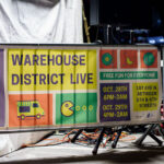 A Warehouse District Live sign in Downtown Minneapolis as seen on Halloween.
