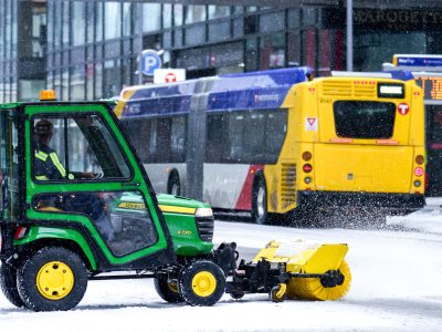 Clearing snow on sidewalks in Downtown Minneapolis