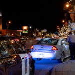 Minnesota State Patrol and a pulled over vehicle with a dog in the window. The Minnesota State Patrol was assisting Minneapolis Police.