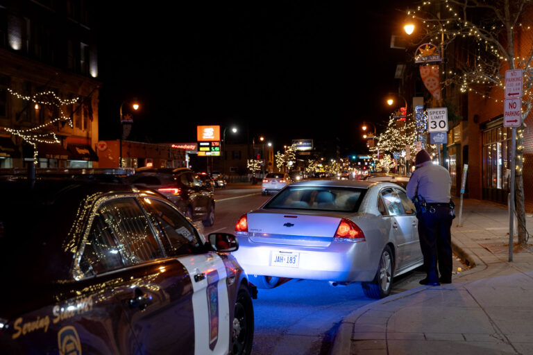 Minnesota State Patrol on Hennepin Avenue 1 Minnesota State Patrol and a pulled over vehicle with a dog in the window. The Minnesota State Patrol was assisting Minneapolis Police.