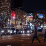 People walk across Lyndale Avenue in Minneapolis in November 2022.