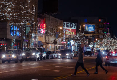 People walk across Lyndale Avenue in Minneapolis in November 2022.