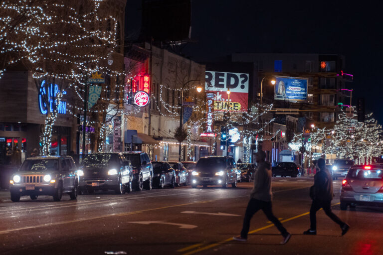 People walk across Lyndale Avenue in Minneapolis 3 People walk across Lyndale Avenue in Minneapolis in November 2022.