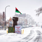 Snow falls on Chicago Avenue. George Floyd Square has been a place of protest since the May 25, 2020 murder of George Floyd.