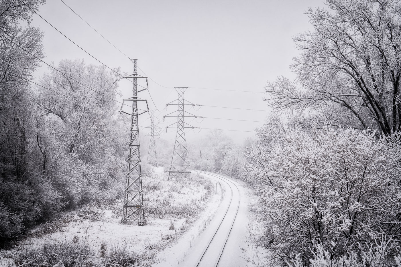 Heavy snowfall over railroad tracks in Minneapolis