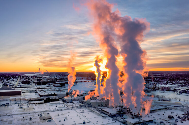 Procter & Gamble Mill at Sunset Green Bay 1 Steam rises from the Procter & Gamble paper mill in Green Bay, Wisconsin, at sunrise.