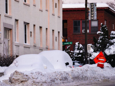 Uptown Minneapolis: Cars Buried After 14" Snowfall on James Ave