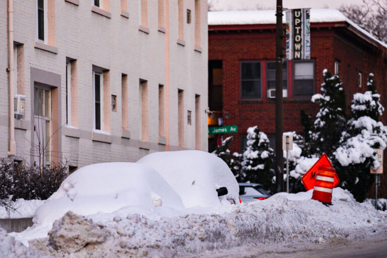 Minneapolis Snow 4 Cars under the snow following a 14" snowfall in Uptown Minneapolis.