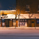 A Minnehaha Liquors sign on the 27th Ave side of the block the liquor store used to stand. The store was burned down in 2020 during unrest over the murder of George Floyd.