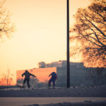 Snowboarders in Minneapolis after a large snowfall.