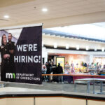 We're Hiring! Minnesota Department of Corrections signage at the Mall of America in Bloomington.