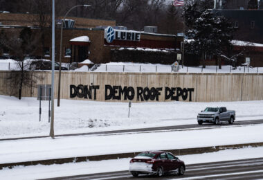 “DONT DEMO ROOF DEPOT” is the message on 394 as environmental groups continue the years long fight over a South Minneapolis warehouse and pollution. The city wants their public works facilities on the former EPA superfund site. Community groups want housing and an urban farm.