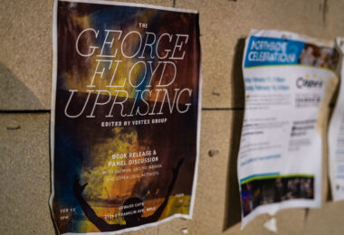 A flyer for "The George Floyd Uprising" book by "Vortex Group" seen at George Floyd Square on February 18, 2023.