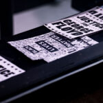 "Justice for George" stickers in a storefront on Hennepin Avenue in Uptown Minneapolis.