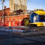 Train moves through the Cedar Riverside train station in South Minneapolis on February 19, 2023.