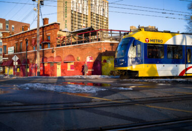 Train moves through the Cedar Riverside train station in South Minneapolis on February 19, 2023.