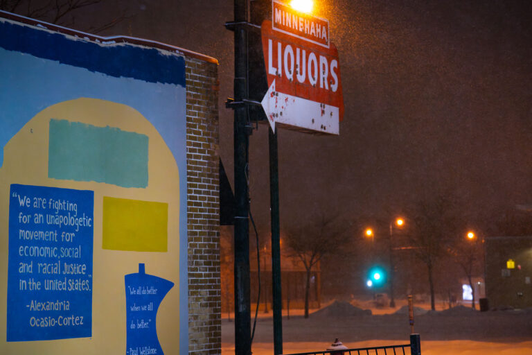 Minnehaha Liquors sign and mural February 2023 4 A mural on the side of a building on East Lake Street. The building across from the Minneapolis Police third precinct survived the riots. Minnehaha Liquors was not as lucky, however the sign remains.