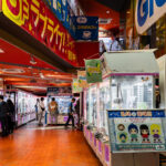 Inside the multi-floor Gigo arcade complex in Akihabara, photographed in March 2023, rows of brightly lit crane and prize machines fill an entire level dedicated to character-themed merchandise and limited-run collectibles. Facilities like this became a defining part of Akihabara’s post-2000s shift from an electronics-focused district to a broader entertainment hub centered around gaming, anime culture, and specialty retail.

Originally operated under the SEGA brand until a 2022 rebranding, Gigo retained the large-scale arcade format that has long been a staple of Tokyo’s urban leisure landscape. The popularity of crane games—often refreshed with seasonal or collaboration prizes—continues to draw both local players and visitors exploring the district’s modern pop-culture identity.
