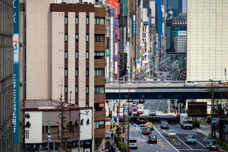 Ginza Street View, Tokyo, Japan 1 Ginza street view, Tokyo, Japan, showing a busy commercial district with traffic and pedestrians.
