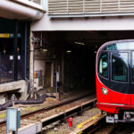A Tokyo Metro Marunouchi Line train approaches its terminal platforms during a March 2023 visit. The Marunouchi Line, one of Tokyo’s earliest postwar subway routes, opened in 1954 and played a key role in connecting the expanding Yamanote district centers with government and commercial areas in central Tokyo. Its distinctive red livery has remained a defining visual identity for decades, even as the rolling stock has undergone multiple modernizations.

Ikebukuro, the northern terminus of the line, is one of Tokyo’s busiest rail hubs, jointly served by JR East, the Seibu and Tobu railway networks, and several Metro lines. The station complex was heavily rebuilt throughout the late 20th century to handle increasing commuter volumes, resulting in the multi-level platform and passageway layout still in use today.