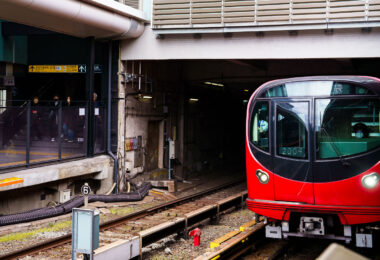 A Tokyo Metro Marunouchi Line train approaches its terminal platforms during a March 2023 visit. The Marunouchi Line, one of Tokyo’s earliest postwar subway routes, opened in 1954 and played a key role in connecting the expanding Yamanote district centers with government and commercial areas in central Tokyo. Its distinctive red livery has remained a defining visual identity for decades, even as the rolling stock has undergone multiple modernizations.

Ikebukuro, the northern terminus of the line, is one of Tokyo’s busiest rail hubs, jointly served by JR East, the Seibu and Tobu railway networks, and several Metro lines. The station complex was heavily rebuilt throughout the late 20th century to handle increasing commuter volumes, resulting in the multi-level platform and passageway layout still in use today.