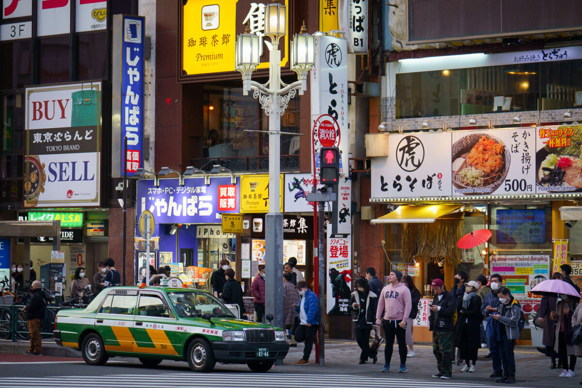 Tokyo Taxi at a Kabukichō Street Crossing