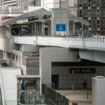 A train arriving at Shimbashi Station in Tokyo Japan.