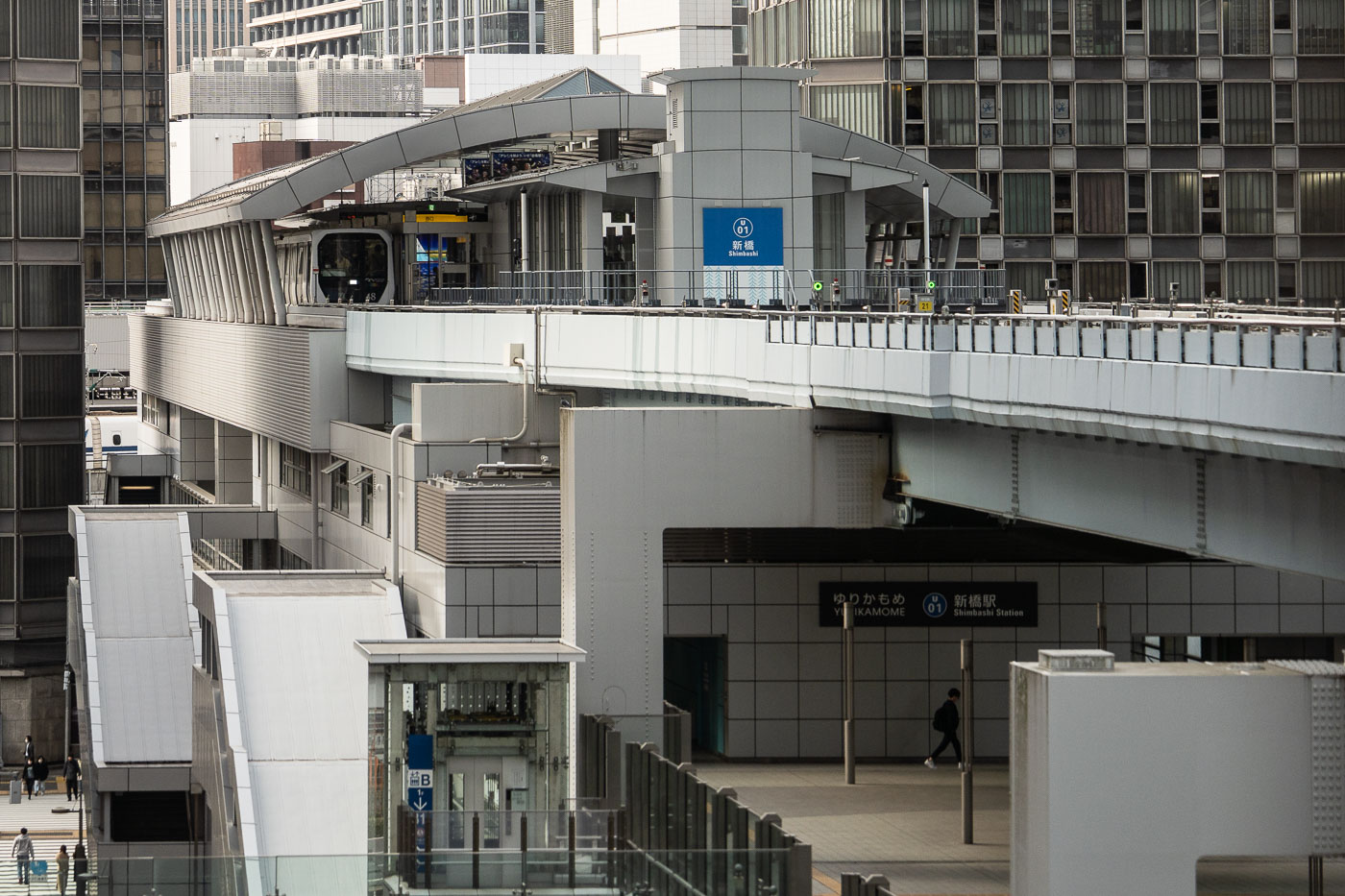 A train arriving at Shimbashi Station in Tokyo Japan.