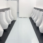 Urinals in a Tokyo bathroom.